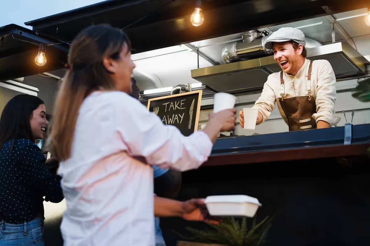 Bartender at the bar and food truck service
